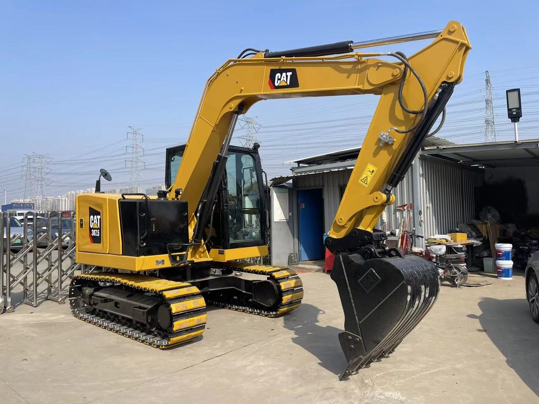 ใช้ Caterpillar 307.5 Excavator 0.33 M3 ความจุของถัง สําหรับโครงการก่อสร้าง
