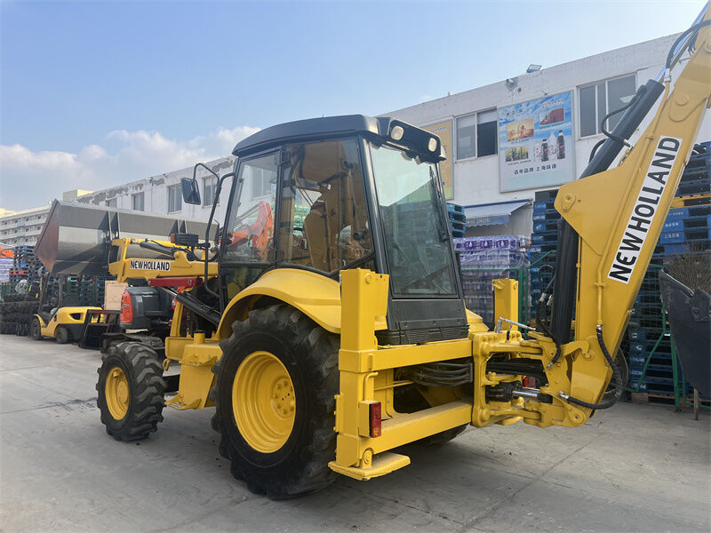 รถขุดตักหลัง LB95B-4PT New Holland มือสอง พร้อมบุ้งกี๋อเนกประสงค์ 4-in-1, ระบบควบคุมแบบ Pilot และห้องโดยสาร ROPS/FOPS