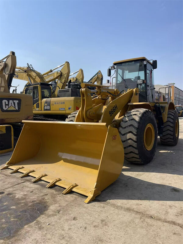 เครื่องบรรทุกล้อ CAT 966H มือสอง พร้อมเครื่องยนต์ Weichai น้ําหนักการทํางาน 23698kgs และความจุของถัง 4.0m3